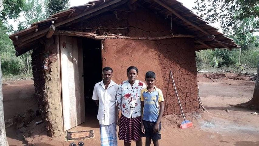 Poor family living in a small house